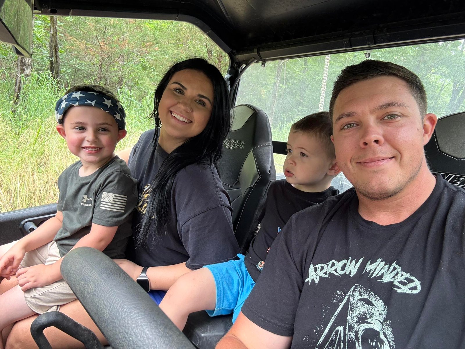 Brennon Allen, owner of Aces Roofing and Exterior Solutions, pictured with his family outdoors in Oklahoma